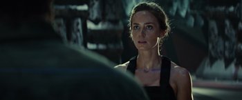 Movie still from “Edge of Tomorrow” (2014), directed by Doug Liman – A person wearing a black shirt; Close Up shot, Over the shoulder angle