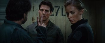 Movie still from “Edge of Tomorrow” (2014), directed by Doug Liman – Tom cruise and rebecca romijn in mission : impossible - ghost protocol; Close Up shot, Over the shoulder angle