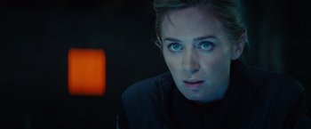 Movie still from “Edge of Tomorrow” (2014), directed by Doug Liman – A person with blue eyes; Close Up shot, Over the shoulder angle