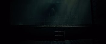 Movie still from “Edge of Tomorrow” (2014), directed by Doug Liman – An empty kitchen with a grill in the middle of the room; Extreme Wide shot, High angle