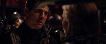Movie still from “Edge of Tomorrow” (2014), directed by Doug Liman – A man and a woman are looking at each other in the dark; Close Up shot, Over the shoulder angle