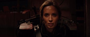Movie still from “Edge of Tomorrow” (2014), directed by Doug Liman – A woman's face in the dark; Close Up shot, Low angle