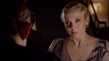 Movie still from “Sherlock” (2010), created by Steven Moffat – A person wearing a dress; Close Up shot, Over the shoulder angle