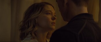 Movie still from “Spectre” (2015), directed by Sam Mendes – A man and a woman looking at one another; Close Up shot, Over the shoulder angle