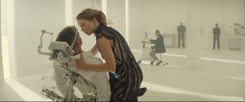 Movie still from “Spectre” (2015), directed by Sam Mendes – A man and a woman are in a room; Medium shot, Low angle