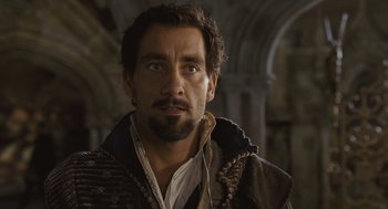 Movie still from “Elizabeth: The Golden Age” (2007), directed by Shekhar Kapur – A person with a beard; Close Up shot, Over the shoulder angle