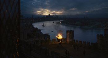 Movie still from “Elizabeth: The Golden Age” (2007), directed by Shekhar Kapur – An image of a fire in the middle of the night; Extreme Wide shot, High angle