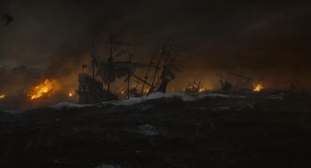 Movie still from “Elizabeth: The Golden Age” (2007), directed by Shekhar Kapur – Many ships in the water at night; Extreme Wide shot, High angle