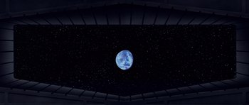 Movie still from “Star Wars: Episode IV - A New Hope” (1977), directed by George Lucas – A view of the earth from the ceiling of a building; Extreme Wide shot, Overhead angle