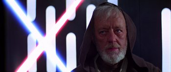 Movie still from “Star Wars: Episode IV - A New Hope” (1977), directed by George Lucas – An older man with a beard and a hooded sweatshirt; Close Up shot, Low angle