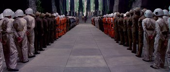 Movie still from “Star Wars: Episode IV - A New Hope” (1977), directed by George Lucas – A long line of people lined up; Extreme Wide shot, High angle