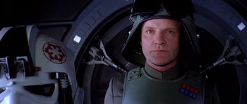 Movie still from “Star Wars: Episode V - The Empire Strikes Back” (1980), directed by Irvin Kershner – A man wearing a helmet in a space suit; Close Up shot, Low angle