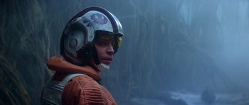 Movie still from “Star Wars: Episode V - The Empire Strikes Back” (1980), directed by Irvin Kershner – A young man in a star wars helmet; Close Up shot, Over the shoulder angle