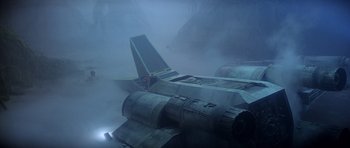 Movie still from “Star Wars: Episode V - The Empire Strikes Back” (1980), directed by Irvin Kershner – A fighter jet sitting on top of an airport runway; Extreme Wide shot, Overhead angle