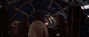 Movie still from “Star Wars: Episode V - The Empire Strikes Back” (1980), directed by Irvin Kershner – A group of people standing inside of an airplane; Wide shot, Overhead angle