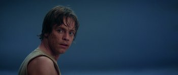 Movie still from “Star Wars: Episode V - The Empire Strikes Back” (1980), directed by Irvin Kershner – A person wearing a shirt; Close Up shot, Low angle