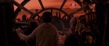 Movie still from “Star Wars: Episode V - The Empire Strikes Back” (1980), directed by Irvin Kershner – A group of people standing in front of a large window; Wide shot, Low angle