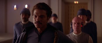 Movie still from “Star Wars: Episode V - The Empire Strikes Back” (1980), directed by Irvin Kershner – A person wearing a uniform; Close Up shot, Over the shoulder angle