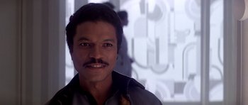 Movie still from “Star Wars: Episode V - The Empire Strikes Back” (1980), directed by Irvin Kershner – A person with a mustache; Close Up shot, Over the shoulder angle