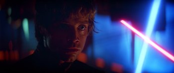 Movie still from “Star Wars: Episode V - The Empire Strikes Back” (1980), directed by Irvin Kershner – A young man's face in the dark; Close Up shot, Low angle