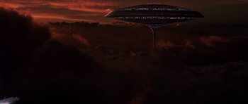 Movie still from “Star Wars: Episode V - The Empire Strikes Back” (1980), directed by Irvin Kershner – An image of an airplane flying in the sky at night; Extreme Wide shot, Low angle