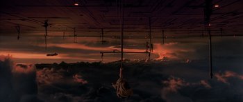 Movie still from “Star Wars: Episode V - The Empire Strikes Back” (1980), directed by Irvin Kershner – A person hanging from a rope in the middle of a room; Extreme Wide shot, Low angle