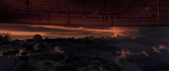 Movie still from “Star Wars: Episode V - The Empire Strikes Back” (1980), directed by Irvin Kershner – A view of the sky from a plane window at sunset; Extreme Wide shot, Low angle