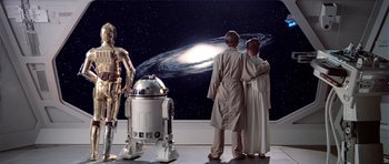 Movie still from “Star Wars: Episode V - The Empire Strikes Back” (1980), directed by Irvin Kershner – A couple of people standing next to each other in front of a wall; Wide shot, Low angle