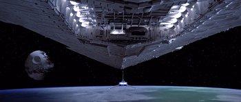 Movie still from “Star Wars: Episode VI - Return of the Jedi” (1983), directed by Richard Marquand – An image of a space ship in the night sky; Extreme Wide shot, Overhead angle