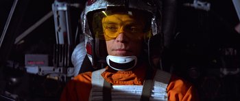 Movie still from “Star Wars: Episode VI - Return of the Jedi” (1983), directed by Richard Marquand – A man wearing a helmet and goggles in the dark; Close Up shot, Low angle