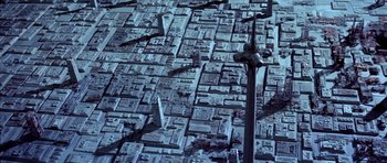 Movie still from “Star Wars: Episode VI - Return of the Jedi” (1983), directed by Richard Marquand – An aerial view of a city filled with lots of buildings; Extreme Wide shot, Overhead angle