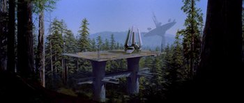 Movie still from “Star Wars: Episode VI - Return of the Jedi” (1983), directed by Richard Marquand – A painting of an airplane flying over a forest; Extreme Wide shot, High angle