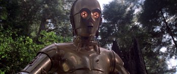 Movie still from “Star Wars: Episode VI - Return of the Jedi” (1983), directed by Richard Marquand – The face of a metal robot; Close Up shot, Low angle