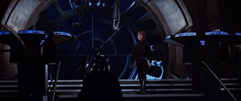 Movie still from “Star Wars: Episode VI - Return of the Jedi” (1983), directed by Richard Marquand – A woman in a star wars costume on a stage; Wide shot, Low angle