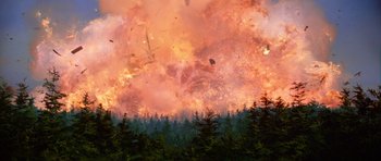 Movie still from “Star Wars: Episode VI - Return of the Jedi” (1983), directed by Richard Marquand – A large fire is burning in the forest; Extreme Wide shot, Low angle