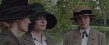 Movie still from “Suffragette” (2015), directed by Sarah Gavron – A woman in a hat and a man in a hat; Close Up shot, Low angle