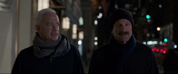 Movie still from “Sully” (2016), directed by Clint Eastwood – Two men are walking down the street at night; Close Up shot, Over the shoulder angle