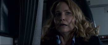 Movie still from “Sully” (2016), directed by Clint Eastwood – A person looking at a mirror; Close Up shot, Low angle