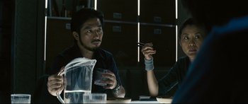 Movie still from “Sunshine” (2007), directed by Danny Boyle – A man and a woman sitting at a dinner table; Close Up shot, Over the shoulder angle