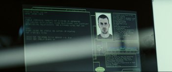 Movie still from “Sunshine” (2007), directed by Danny Boyle – A computer screen with a man's face on it; Extreme Close Up shot, Over the shoulder angle