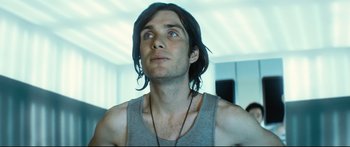 Movie still from “Sunshine” (2007), directed by Danny Boyle – A person with long black hair; Close Up shot, Low angle