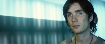Movie still from “Sunshine” (2007), directed by Danny Boyle – A person's face in front of a window; Close Up shot, Low angle