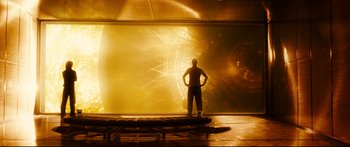 Movie still from “Sunshine” (2007), directed by Danny Boyle – A man standing in front of a large window; Wide shot, Over the shoulder angle