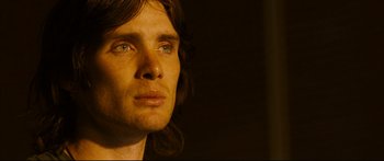 Movie still from “Sunshine” (2007), directed by Danny Boyle – A person with long brown hair; Close Up shot, Over the shoulder angle