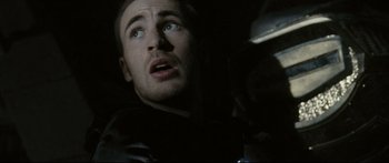 Movie still from “Sunshine” (2007), directed by Danny Boyle – A person looking up at the sky; Close Up shot, Low angle