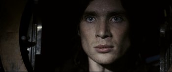 Movie still from “Sunshine” (2007), directed by Danny Boyle – A person with blue eyes; Close Up shot, Low angle