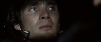Movie still from “Sunshine” (2007), directed by Danny Boyle – A person's eyes and face; Extreme Close Up shot, Low angle