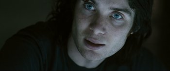 Movie still from “Sunshine” (2007), directed by Danny Boyle – A person with blue eyes; Close Up shot, Low angle