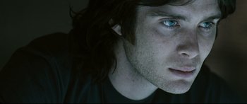 Movie still from “Sunshine” (2007), directed by Danny Boyle – A man's face with long hair; Close Up shot, Over the shoulder angle