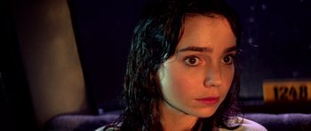 Movie still from “Suspiria” (1977), directed by Dario Argento – A person with wet hair; Close Up shot, High angle